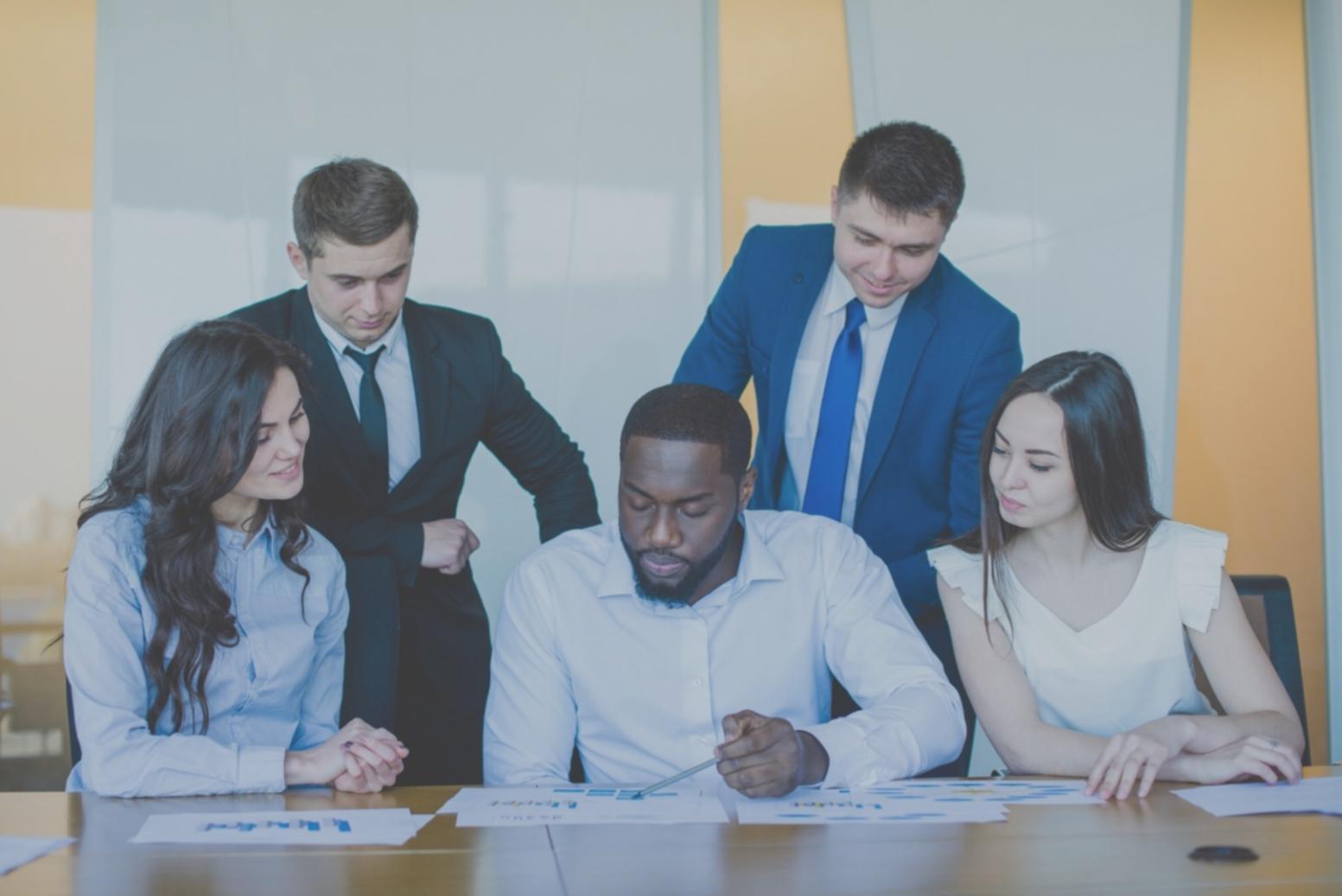 Australian family reviewing budget documents together at kitchen table
